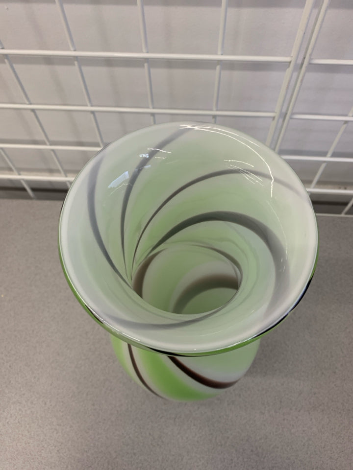 LARGE GREEN AND BROWN SWIRL VASE.