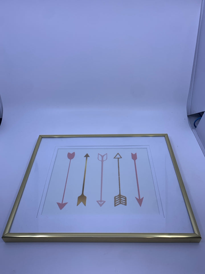 PINK AND GOLD ARROWS IN GOLD FRAME.