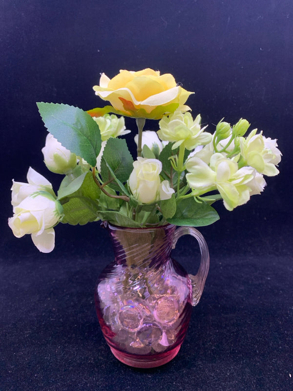 PINK GLASS PITCHER VASE WITH WHITE FLOWERS.