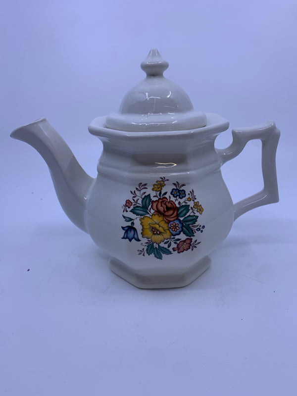 WHITE TEAPOT W/ RED/BLUE/YELLOW FLOWERS.