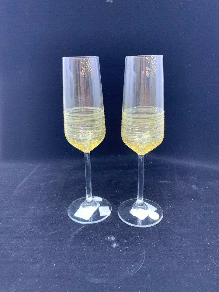 2 NEW MARIPOSA CHAMPAGNE GLASSES WITH GOLD SWIRLS.