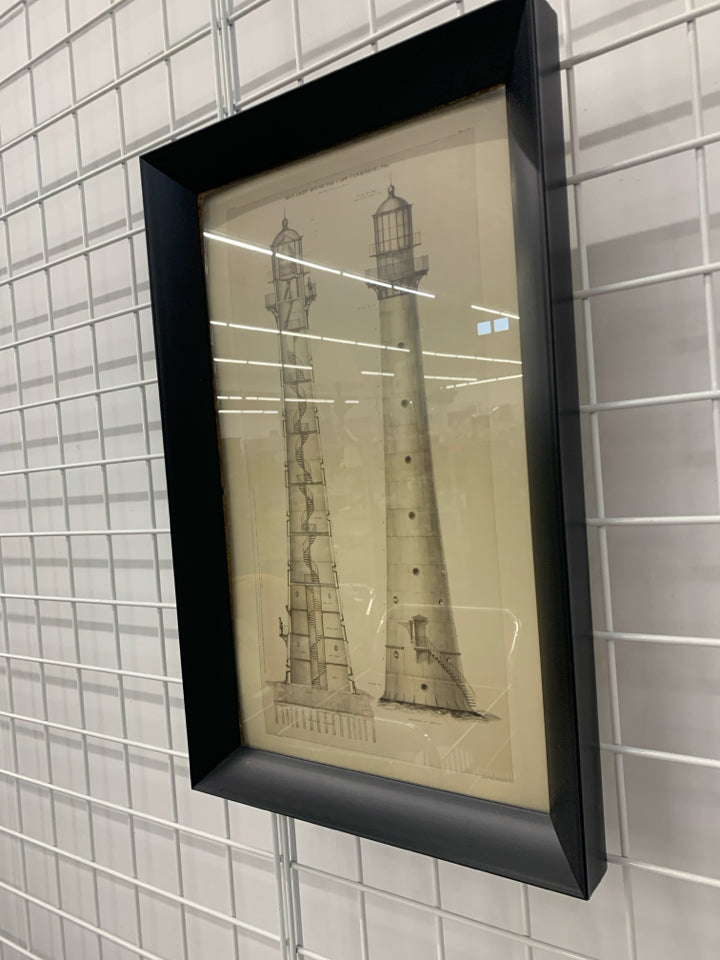 "IRON LIGHTHOUSE FOR CAPE CANAVERAL" IN BLACK FRAME WALL HANGING.