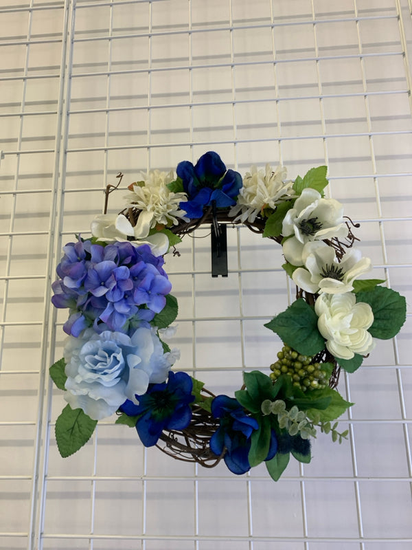 BLUE AND WHITE FLOWERS W/ PIP BERRIES TWIG WREATH.
