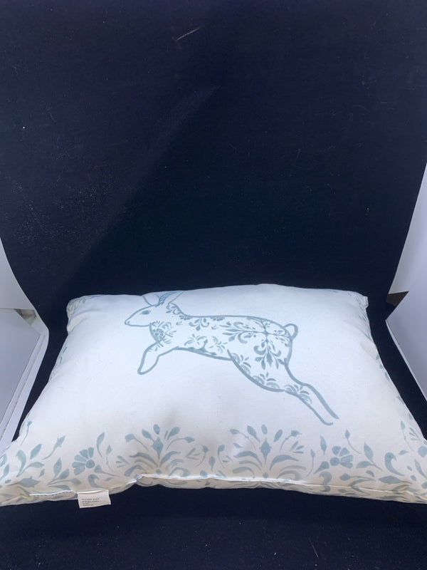 WHITE AND BLUE BUNNY ACCENT PILLOW.