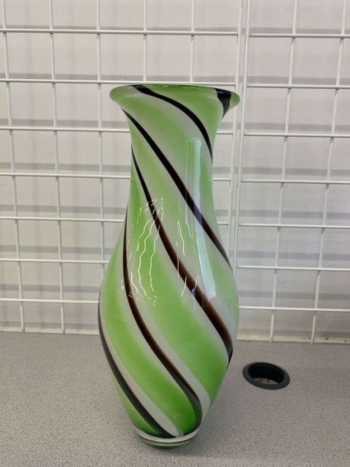 LARGE GREEN AND BROWN SWIRL VASE.