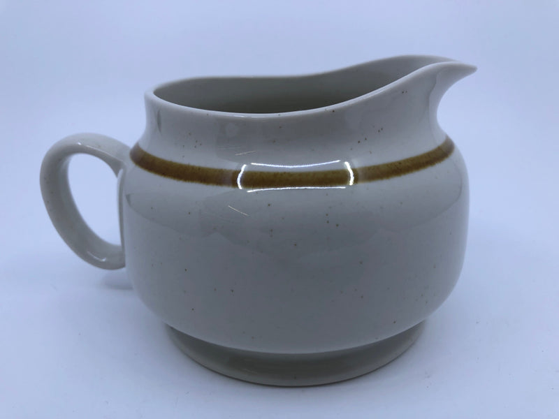 BROWN AND CREAM PITCHER.